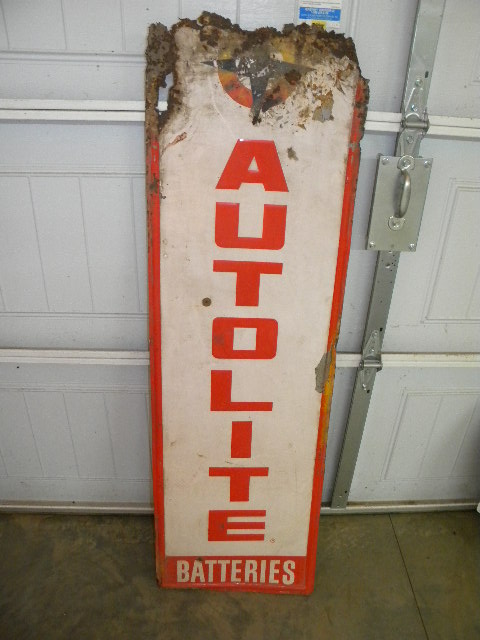 $OLD Autolite Embossed Tin Sign
