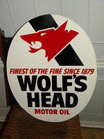 $OLD Wolfs Head Tin Flange Sign