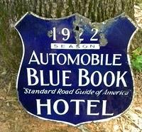 SOLD: Porcelain Automobile Blue Book Shield Sign